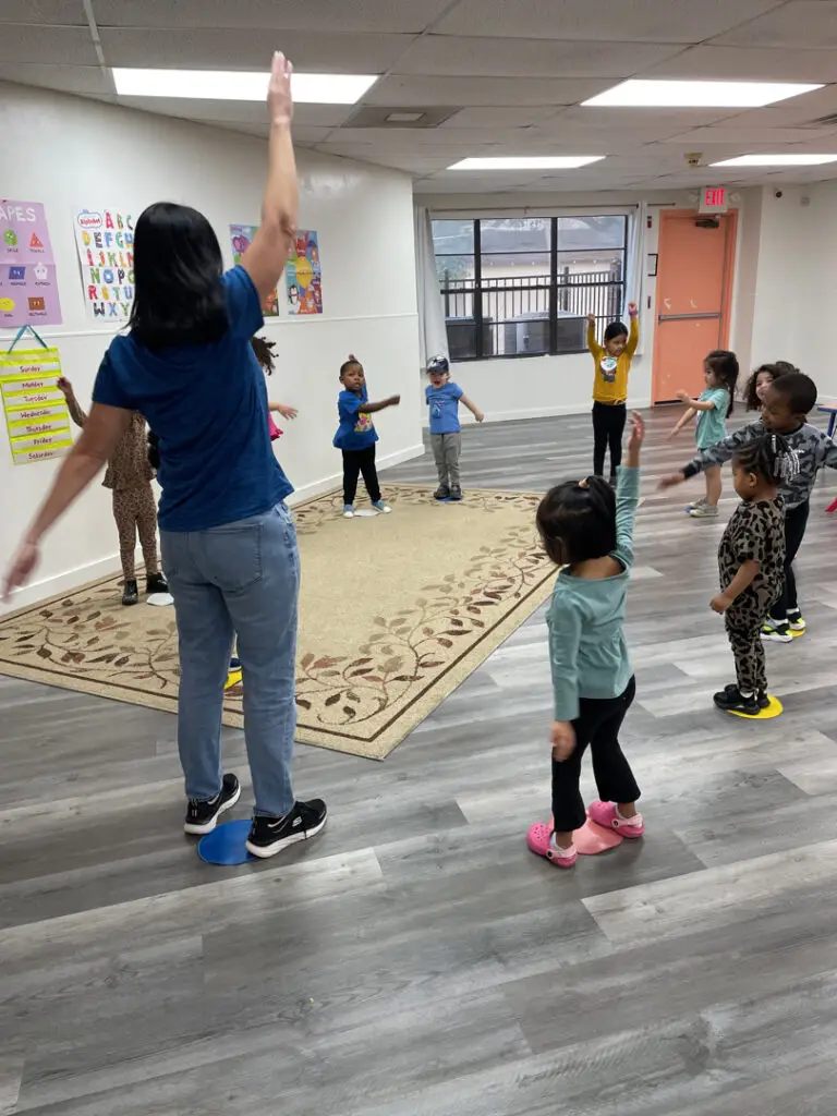 Children playing in a spacious, clean Sunshine Daycare classroom